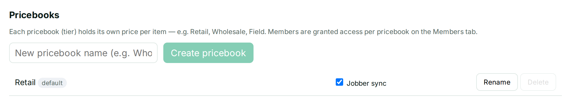 The Pricebooks card in Settings, listing one pricebook named Retail with a default pill beside it and a Jobber sync checkbox.